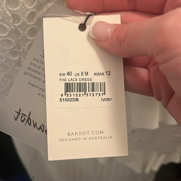 Never worn - perfect for bridal shower- added cups in for support from tailor - - Picture 4 of 5